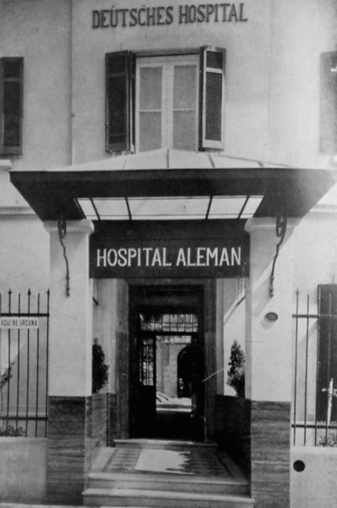 Entrance to the German Hospital (Hospital Alemán) in Buenos Aires, with signage in German and Spanish, demonstrating the support provided by immigrant communities.